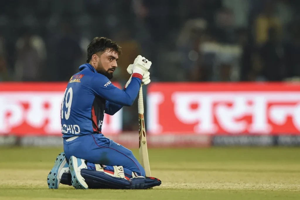 Rashid Khan sinks his knees after being crashed out of the Asia Cup 2023