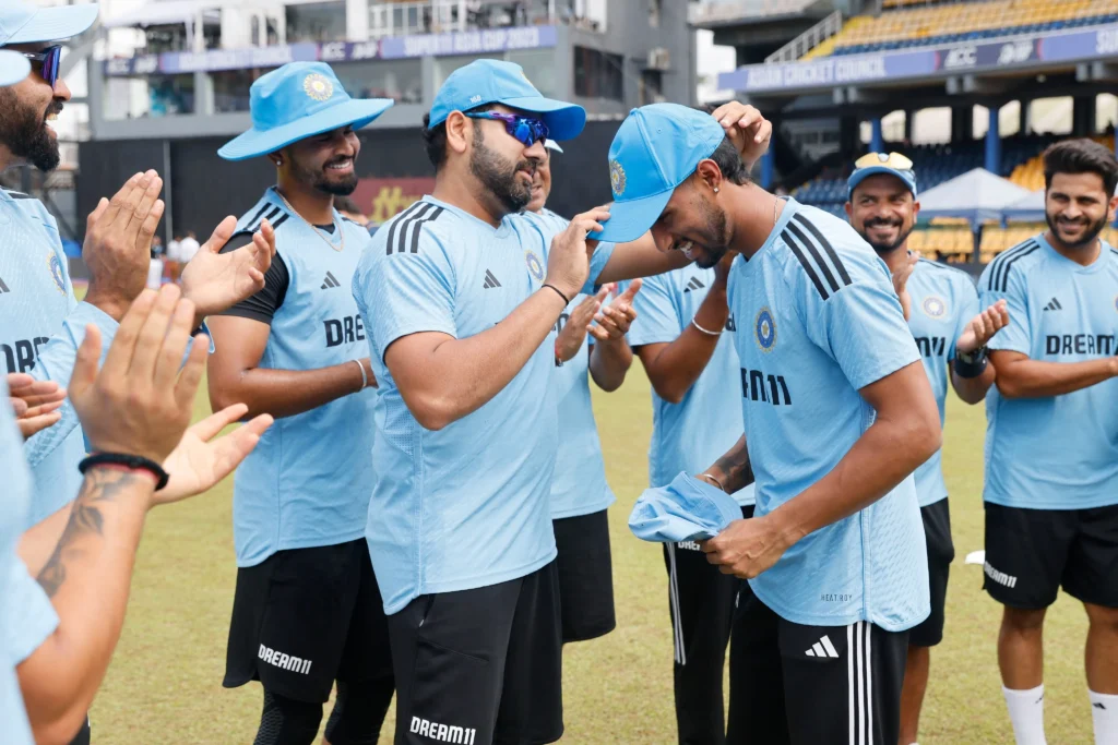 Tilak-Varma-as-he-receives-his-_TeamIndia-ODI-cap-from-captain-Rohit-Sharma